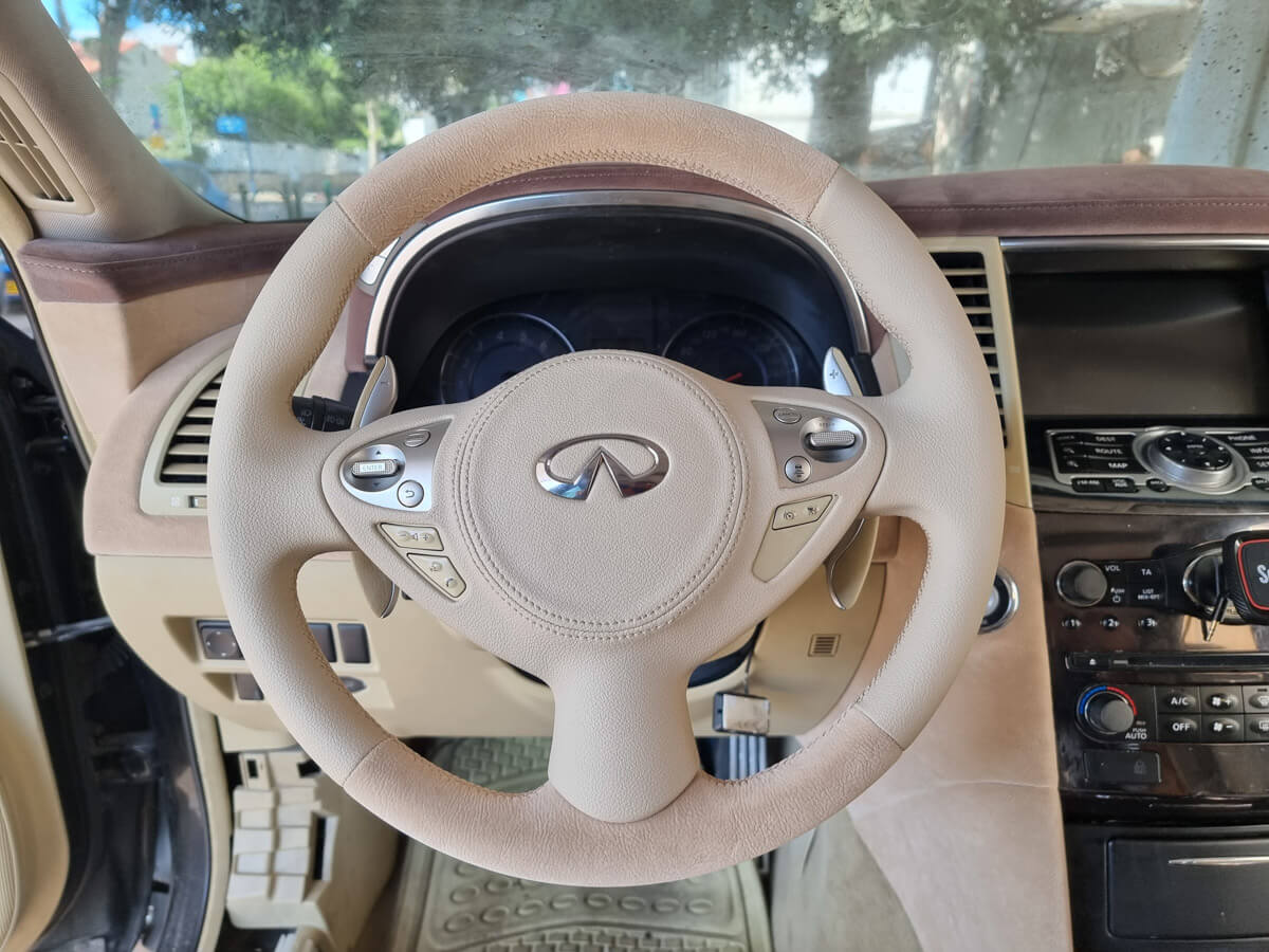 ריפוד הגה וכרית אוויר בשילוב בדים