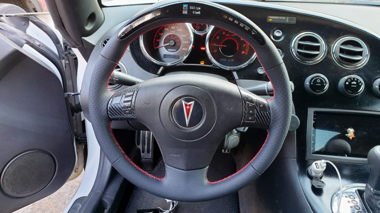 הגה עם פס מירכוז דיגיטלי